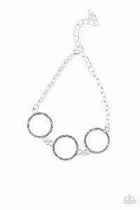 Dress The Part - Paparazzi - Silver Hematite Rhinestone Rings Clasp Bracelet