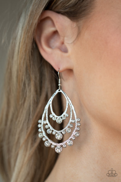 Break Out In TIERS - Paparazzi - White Rhinestone Tiered Silver Frame Earrings