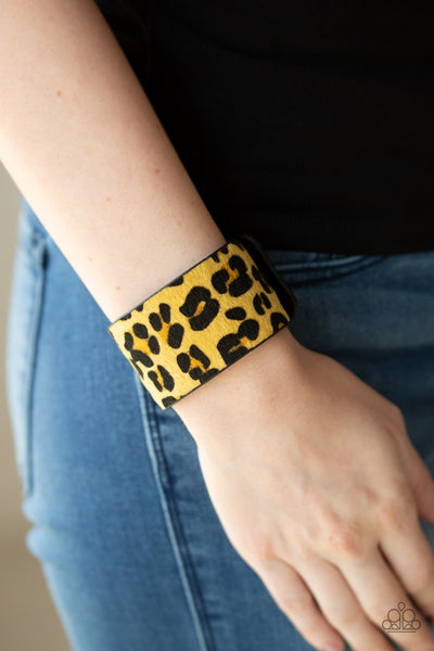 Cheetah Cabana – Paparazzi – Yellow Fuzzy Cheetah Pattern Black Leather Wrap Bracelet