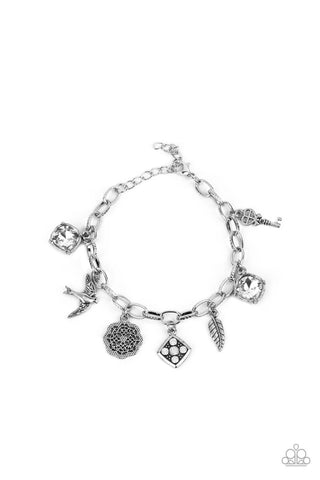 Fancifully Flighty - Paparazzi - White Rhinestone Silver Bird Feather Floral Charm Bracelet