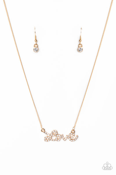 Head Over Heels In Love - Paparazzi - Gold "Love" White Rhinestone Pendant Necklace