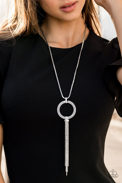 Not A HEIR Out Of Place - Paparazzi - White Rhinestone Circular Pendant Silver Tassel Necklace
